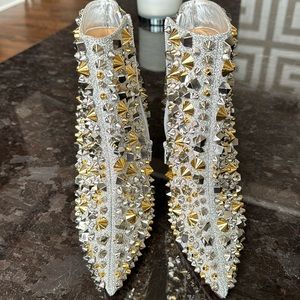Christian Louboutin, brand new never been worn bootie. Size 39